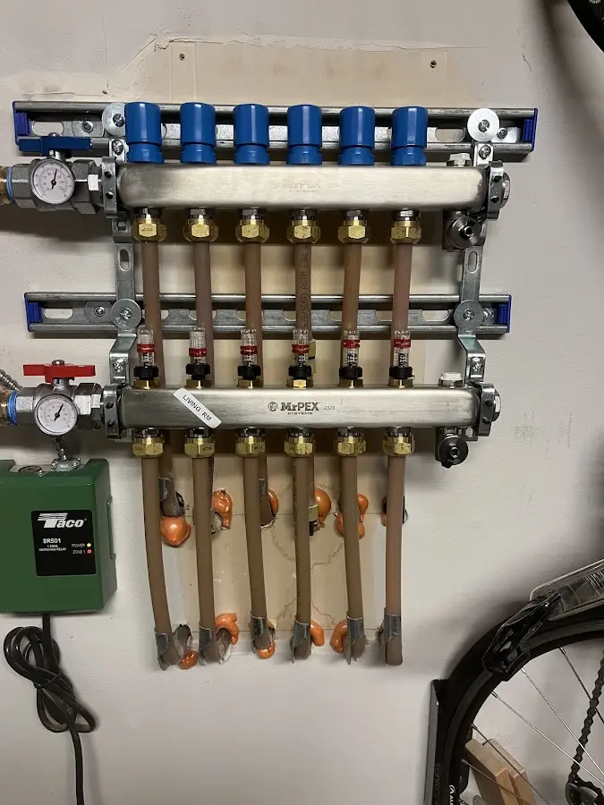 Plumber performing Gas Leak Detection at a residential property in Dranesville