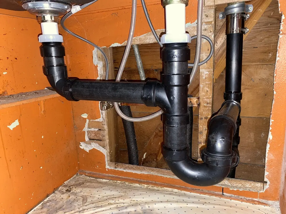Professional Garbage Disposal Repair equipment and tools on the job in Dranesville